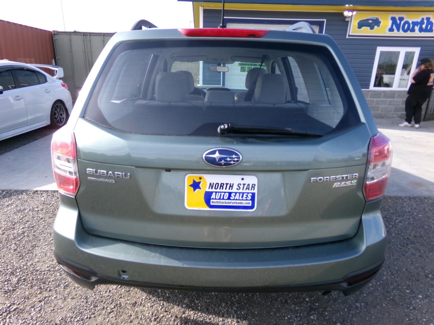 2015 Green Subaru Forester 2.5i Premium (JF2SJABC5FH) with an 2.5L H4 SOHC 16V engine, 6-Speed Automatic transmission, located at 2630 Philips Field Rd., Fairbanks, AK, 99709, (907) 458-0593, 64.848068, -147.780609 - Photo#3